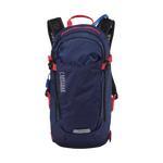 CamelBak M.U.L.E. hydration backpack in navy blue with red trim and black mesh