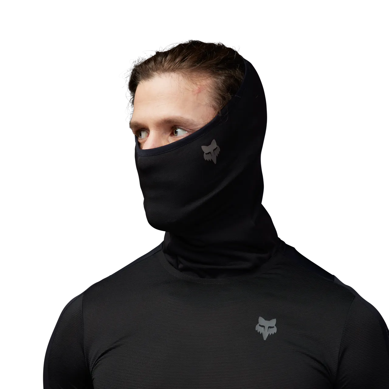 Fox Racing black Polartec neck gaiter worn by model showing coverage and fit