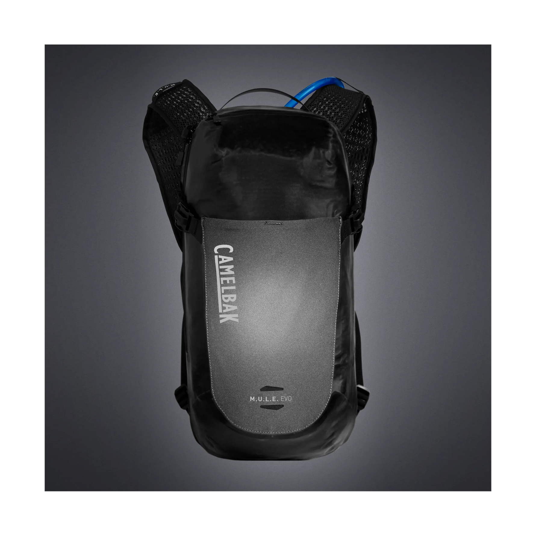 CamelBak M.U.L.E. EVO black hydration backpack with gray panel on gray background