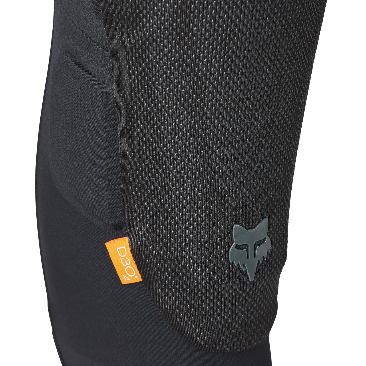 Fox Racing Launch Elite knee pad in black with mesh texture and orange D3O logo