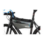 CamelBak frame pack mounted on black mountain bike showing storage compartment and mesh pocket