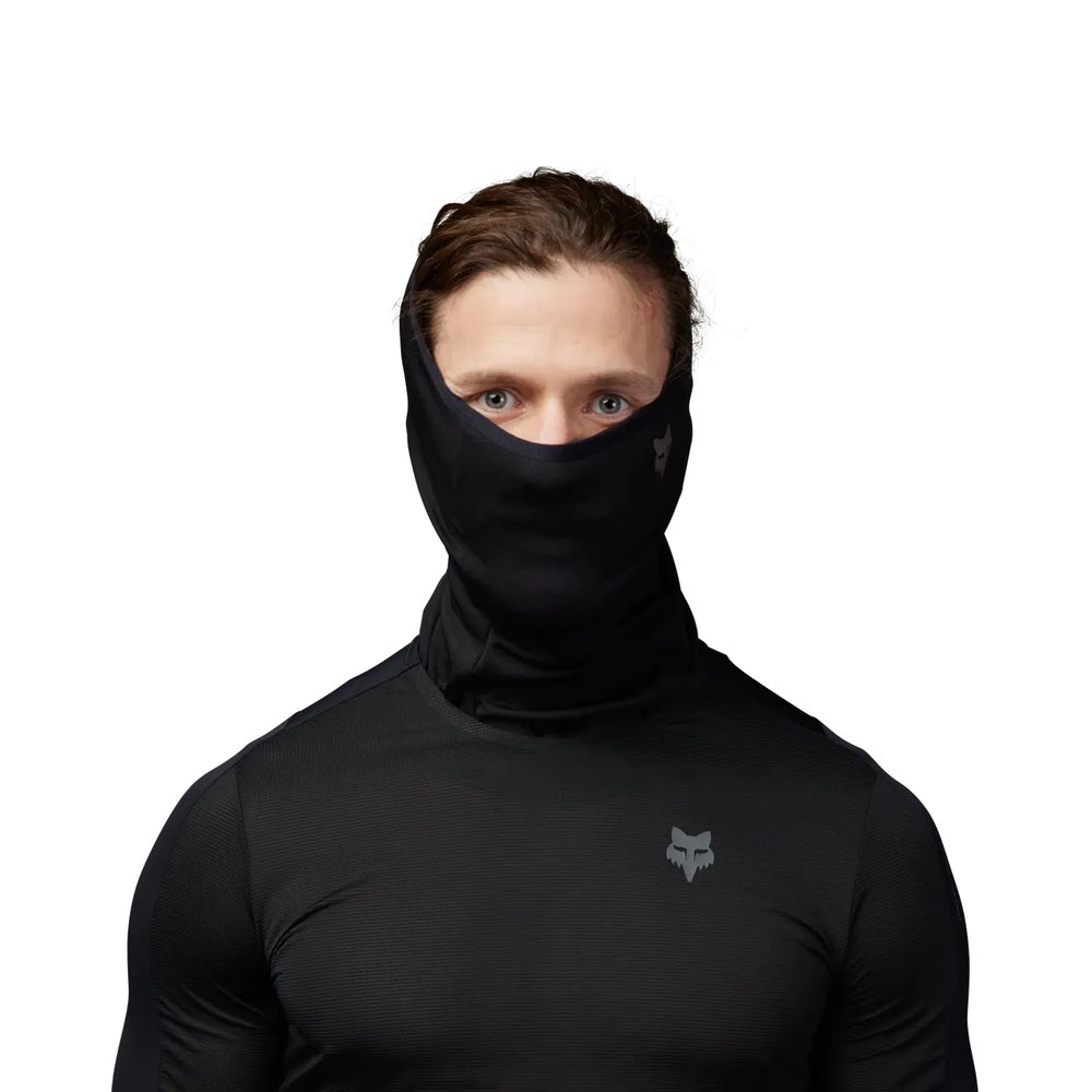 Person wearing black Fox Racing Polartec neck gaiter covering nose and mouth area