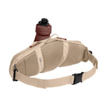 CamelBak waist pack with water bottle in beige color against white background