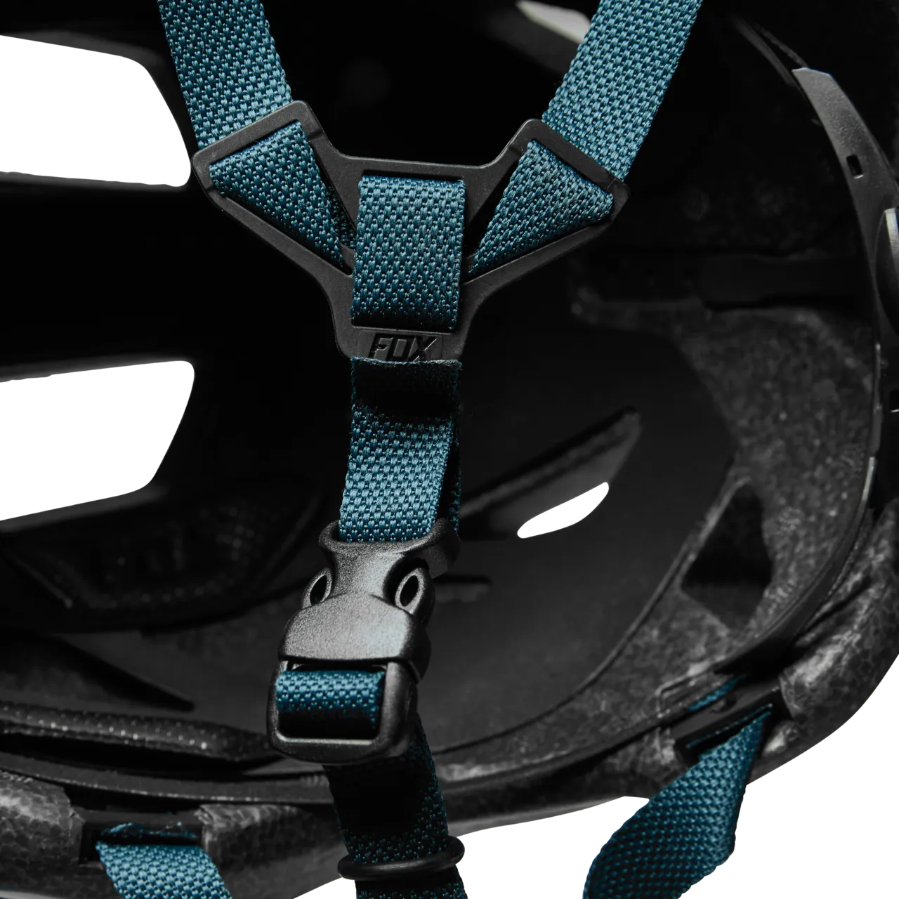 Fox Racing Youth Mainframe Helmet interior showing teal blue padding and strap system