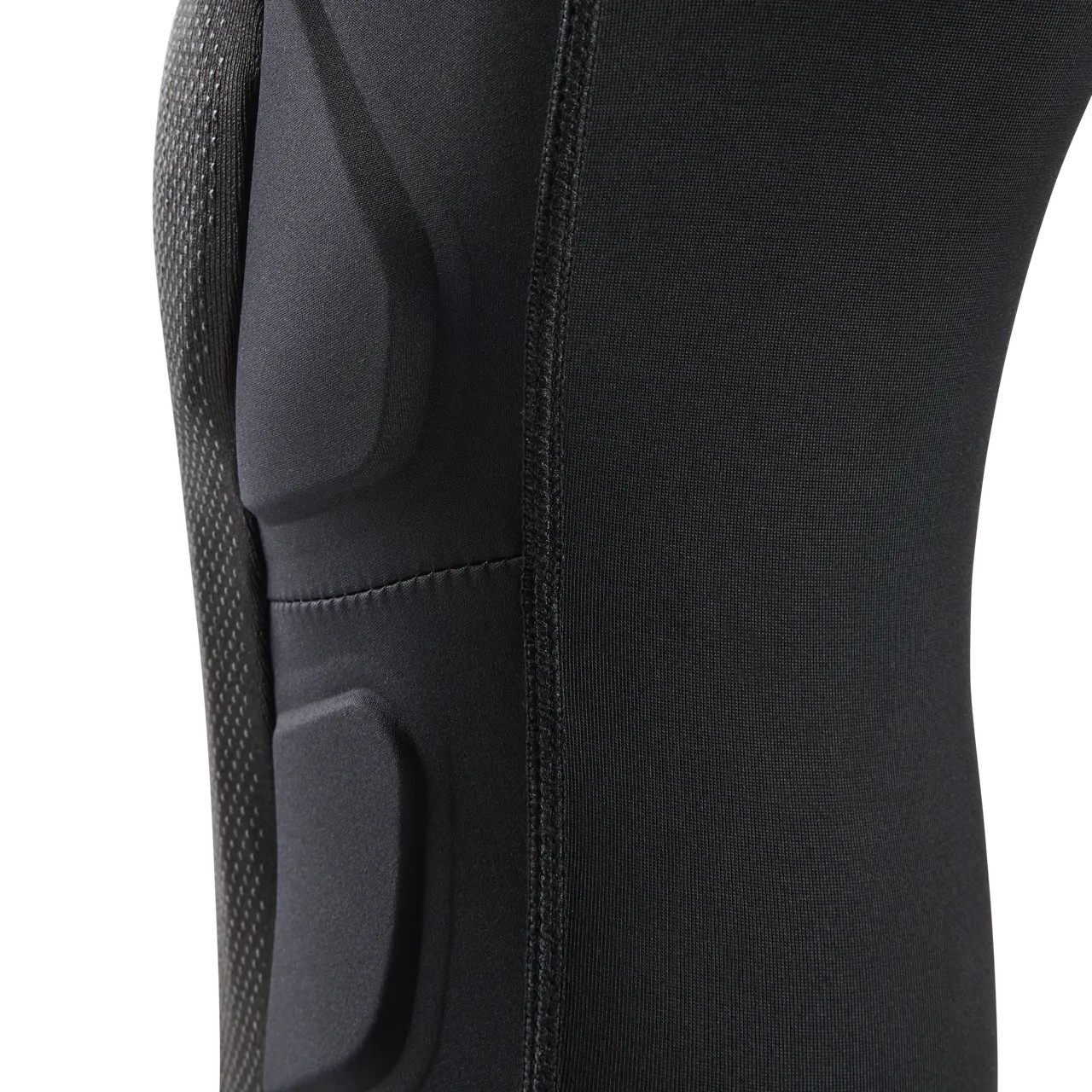 Fox Racing Launch Elite knee pad showing black fabric with protective padding and seam details