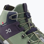 On Cloudtrax hiking shoe in midnight and olive green colorway with mesh upper
