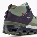 On Cloudtrax running shoe in sage green and midnight purple colorway