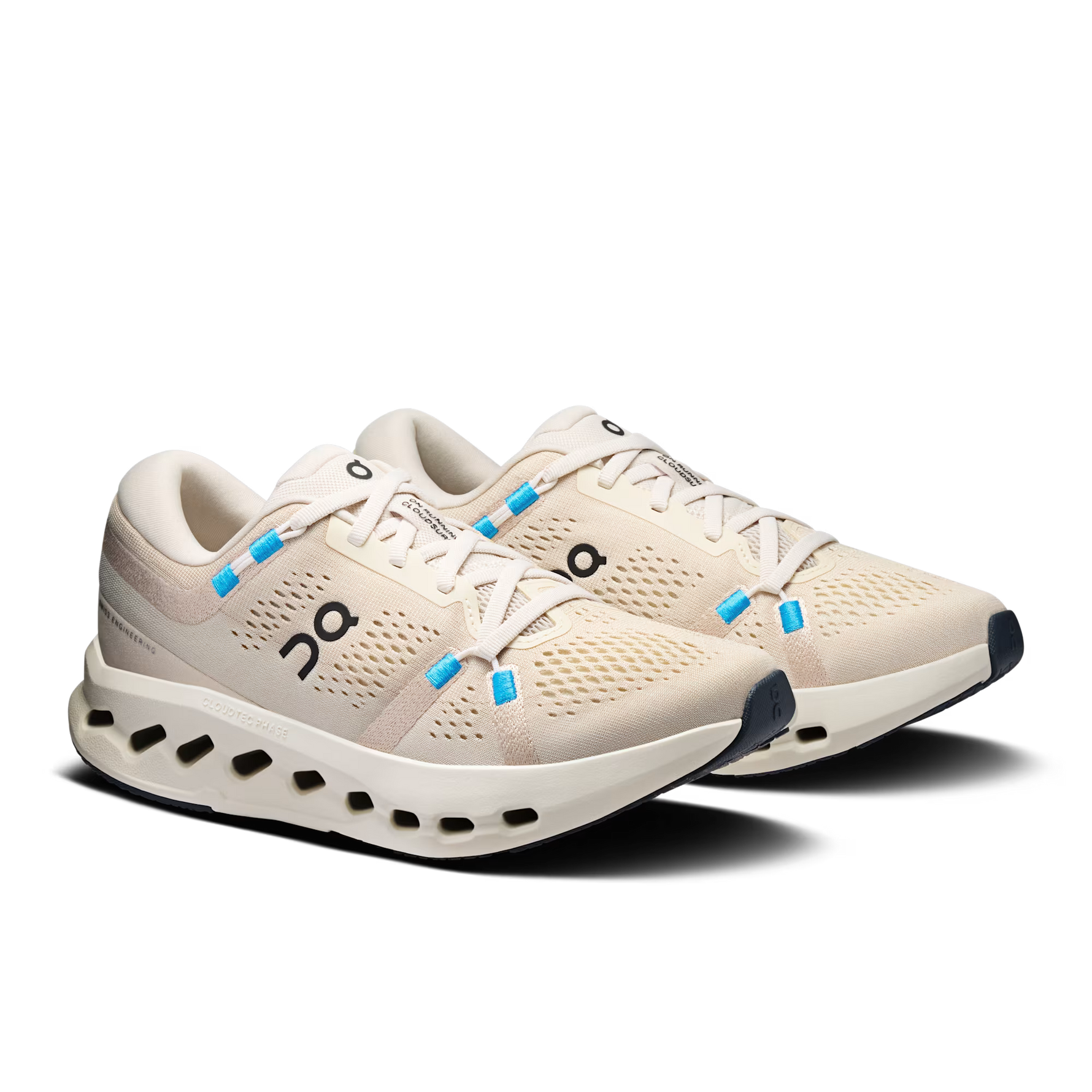 On Cloudsurfer women's running shoes in pearl ivory with blue laces and signature CloudTec sole