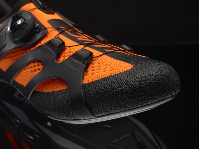 DMT KR2 road cycling shoe in black and fluorescent orange colorway with BOA dial closure